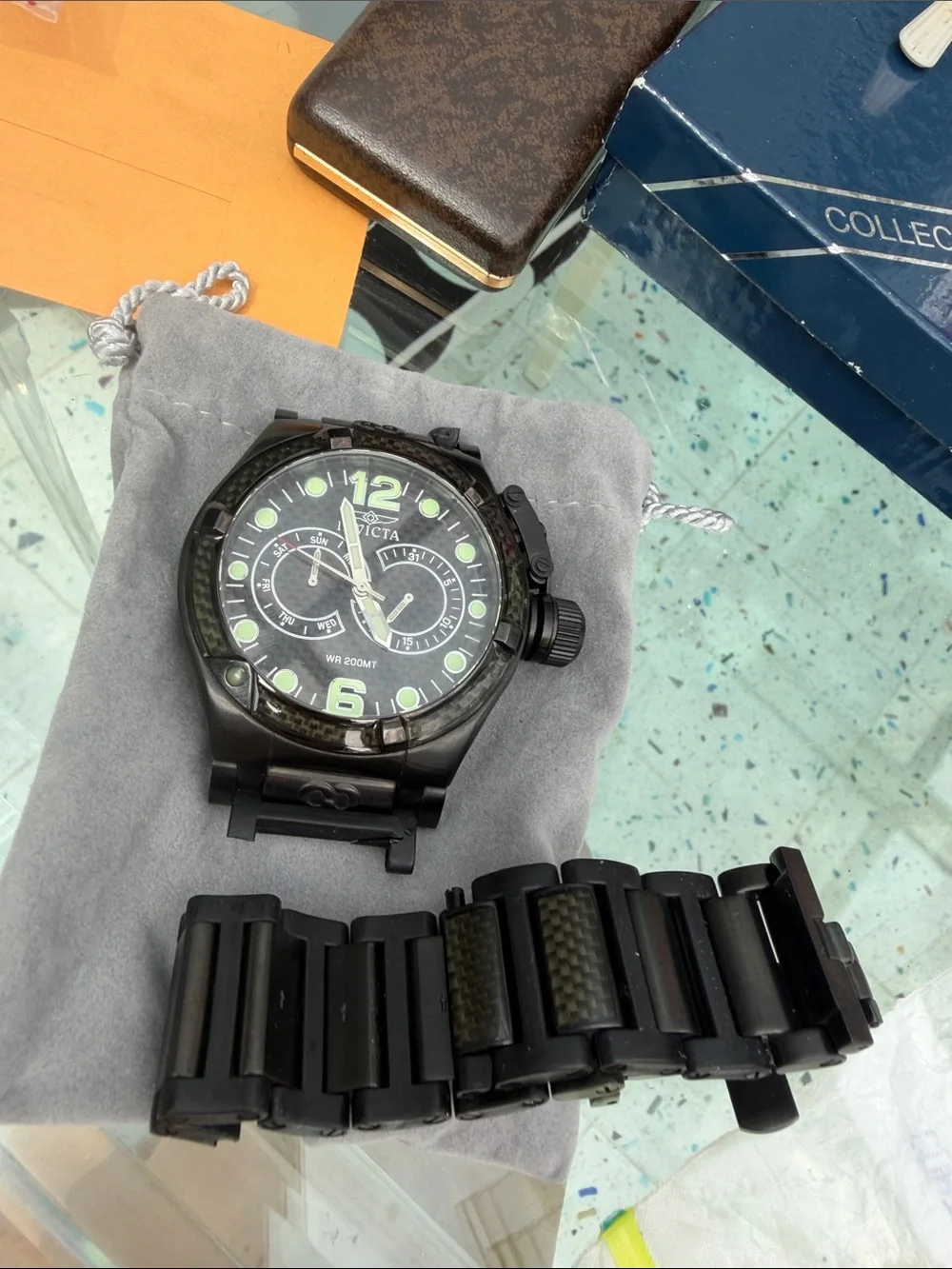 Invicta Black Watch with Green Accents